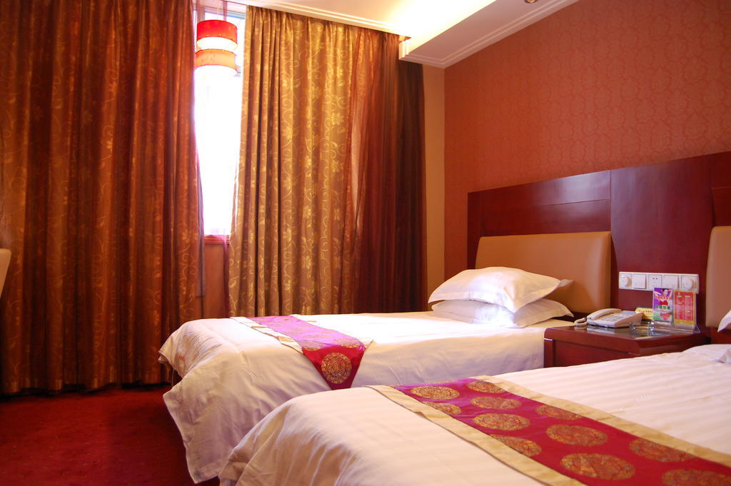 Jinyao Business Hotel Jivu Szoba fotó