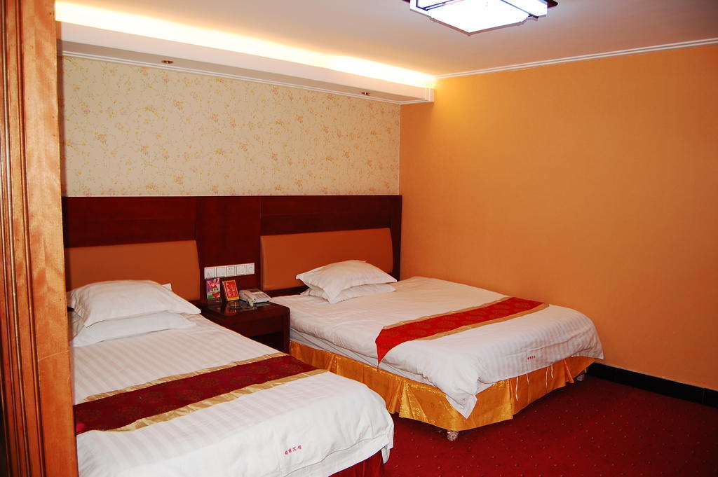 Jinyao Business Hotel Jivu Szoba fotó